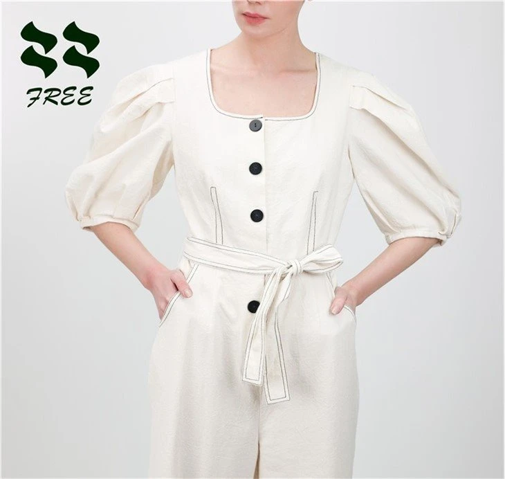 white jumpsuit with belt